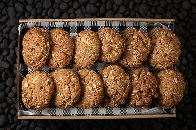 A box of freshly baked Anzac Biscuits