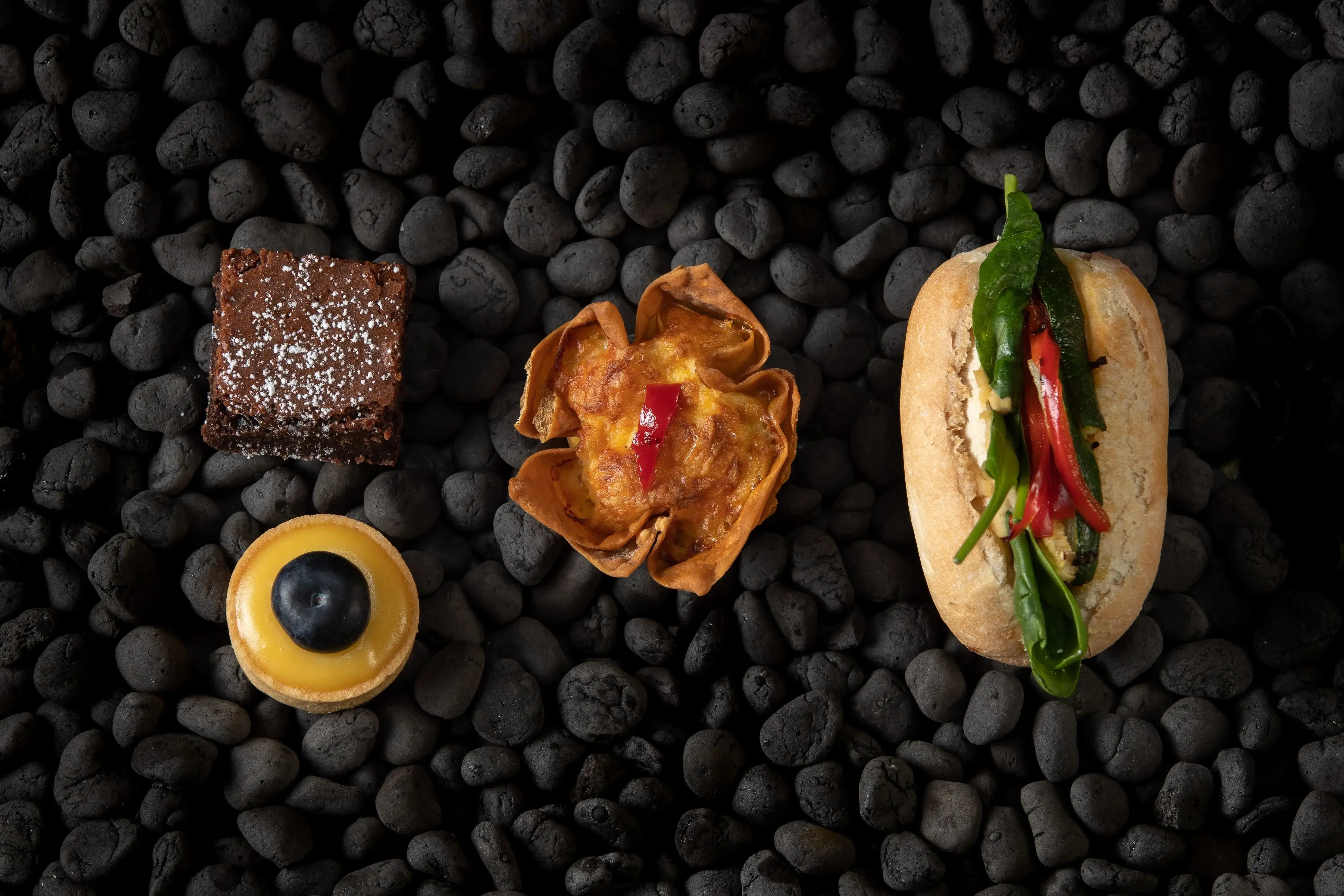 savoury snacks presented on a dark